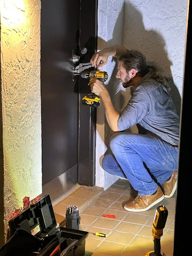 Keith installing a lock on-site