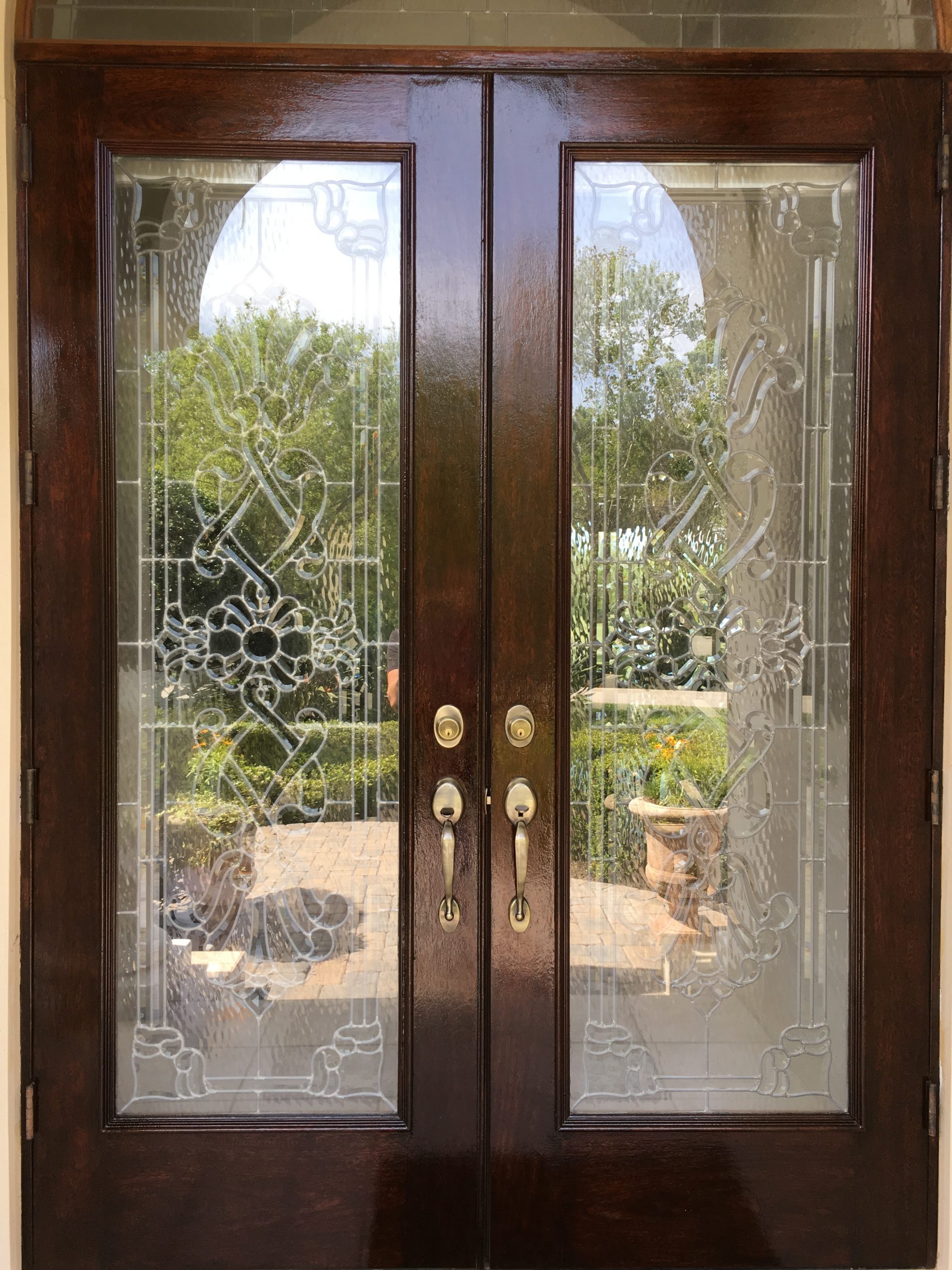 Schlage handleset on ornate glass double door