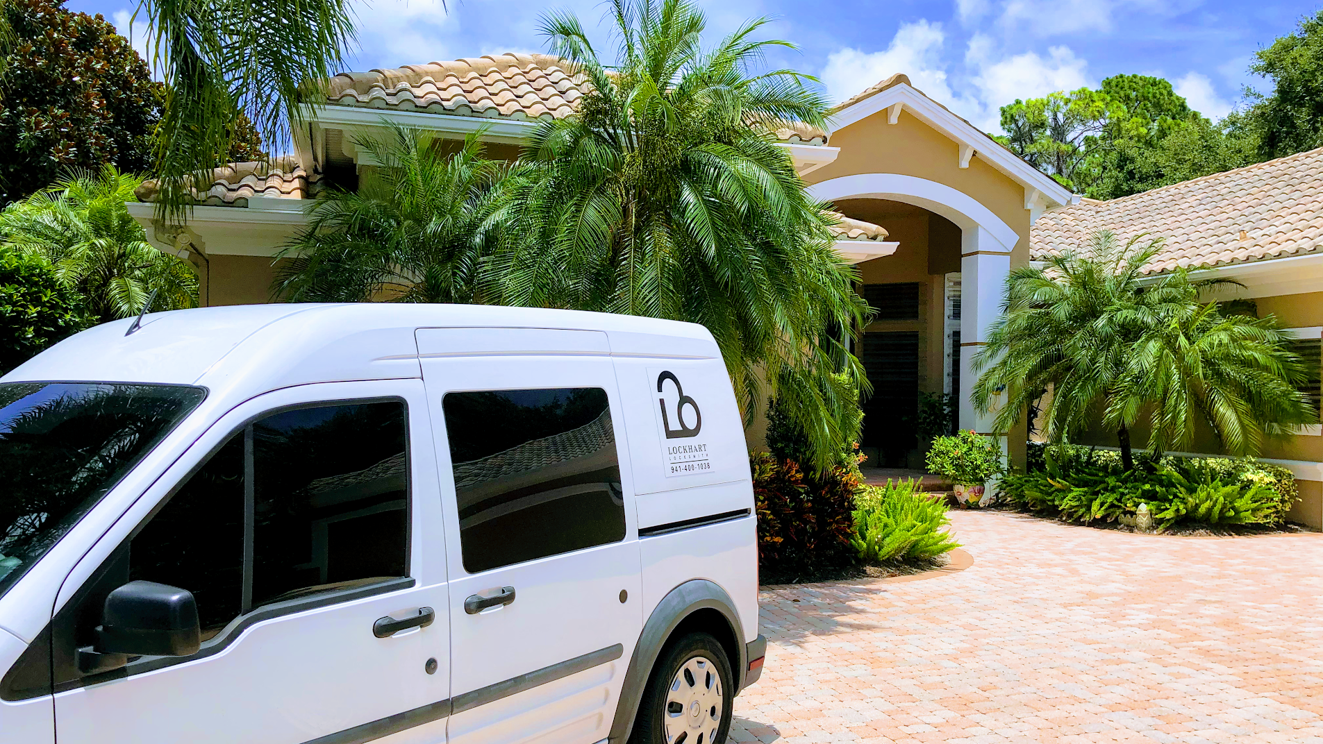 Lockhart Locksmith van at a Sarasota home